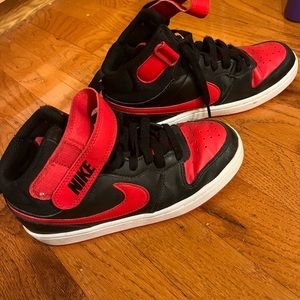 Boys Nike high tops.